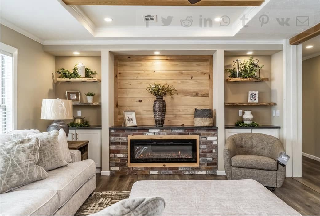 Cozy living room with beige tones, featuring a brick fireplace, wooden shelves with plants, a soft sofa, and a round armchair, creating a warm ambiance.