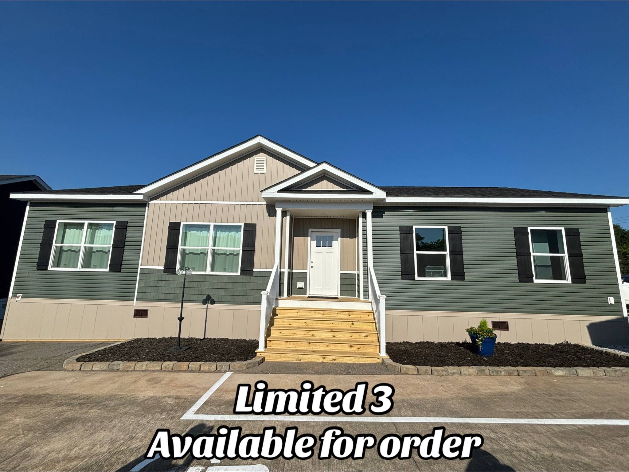 Single-story manufactured home with a beige and green exterior, white trim, and a small porch. Text overlay: "Limited 3 Available for order." Clear sky backdrop.