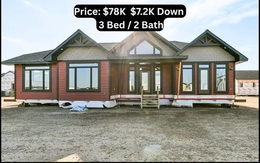 Alt text: "Split image of a red, single-story house with a large porch and a modern bathroom featuring a glass shower and dual windows. The house is priced at $78K with a $7.2K down payment and includes 3 bedrooms and 2 bathrooms."